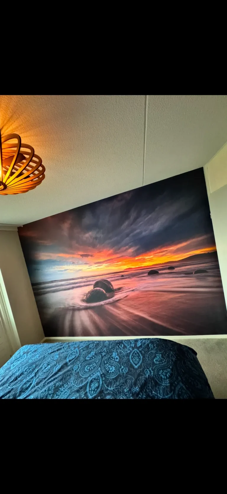 Fotobehang met zonsondergang aan zee
